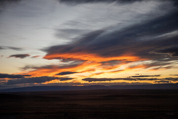 Dramatic red gray sunset in wild Wyoming prairie