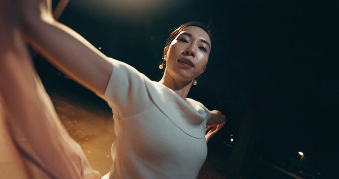 Ballet, performance and portrait with Japanese woman in city for balance, theater and elegant dance. Talent, art and feminine with person or ballerina dancer at night for recital, music or practice
