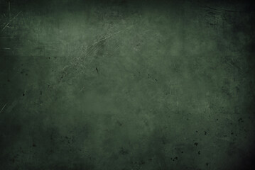 Fototapeta premium Grungy dark green texture featuring scratches and subtle stains, ideal for use as a vintage or industrial background.