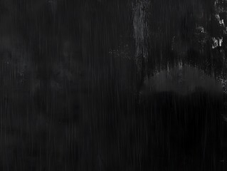 Dark textured background with streaks and shades of gray.