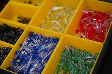 Assorted LED Lights in Storage Bins