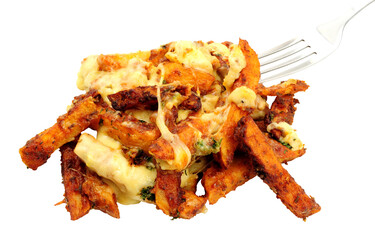 Portion of cheesy dirty fries, fried battered skin on potato chips topped with Monterey jack cheddar cheese, bacon sauce and mozzarella and jalapenos isolated on a white background