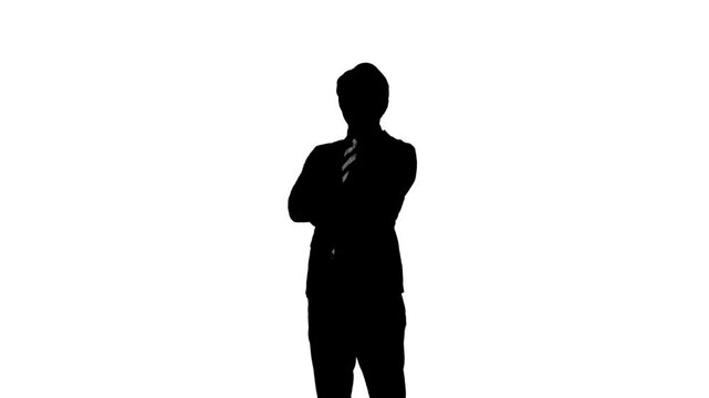 腕組みする男性ビジネスパーソンのシルエット