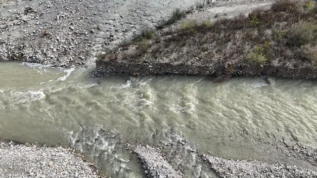 Arda River flowing through rocky landscape, creating dynamic patterns and textures in Val Tolla, Lugagnano D'Arda, Piacenza, Italy