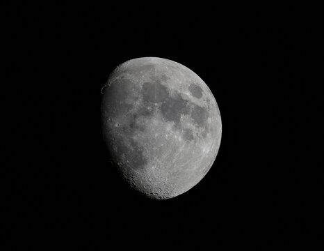 waxing gibbous moon on night sky