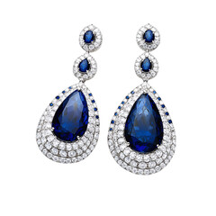 Elegant earrings featuring large blue gemstones surrounded by sparkling diamonds, showcasing a...