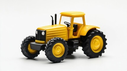 Yellow toy tractor on white background. (1)