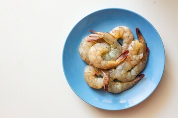 Peeled shrimp  Fresh shrimp in ceramic plate ,Fresh prawn raw seafood  on white background