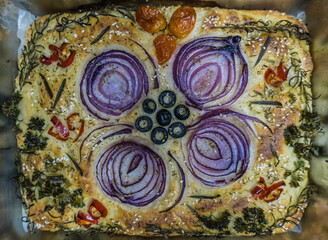 A Foccacia Bread with decoration food, all ready to be enjoyed as a delicious meal or sweet dessert