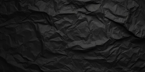 Textured Crumpled Black Paper Background Suitable for Graphic Design, Print Projects, and Creative Artwork Exploration
