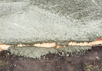 A cement slab with a lot of cement on it