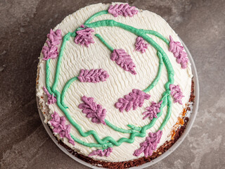 round cake with flowers. cake with lavender. cake with cream