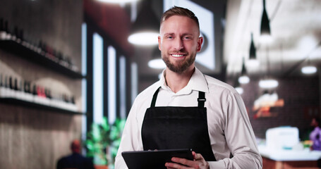 Restaurant Waiter With Tablet. Shop Owner