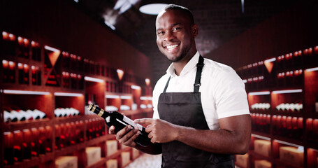 Wine Service Waiter Holding A Bottle
