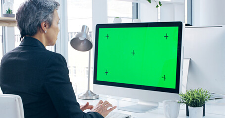 Green screen, computer and businesswoman in office with research for stock market. Technology, tracking markers and mature female financial advisor on desktop for capital gain investment mockup