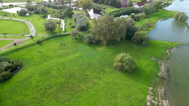 Aerial footage of the Loevestein Castle at sunset in Zaltbommel, Gelderland, the Netherlands