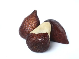  Salak fruit and one half peeled snake fruit isolated on a white background