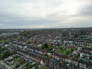 Fototapeta premium Aerial View of Downtown and Central Rugby City of England Great Britain. Aerial View Was Captured with Drone's Camera During Mostly Cloudy and Rainy Day on April 8th, 2024 from Medium High Altitude.