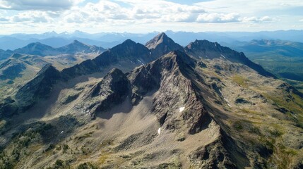 Obraz premium Breathtaking aerial view of rugged mountain peaks with serene alpine landscapes, captured from a helicopter soaring above the majestic wilderness