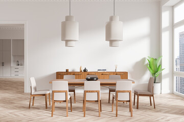 Modern dining room with wooden chairs, table, and sideboard in a well-lit space with large windows and minimalist decor on white background. 3D Rendering