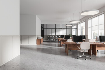 Modern open-space office interior with wooden desks, chairs, and computers. Minimalist design, large windows, and glass partitions. Bright and spacious. 3D Rendering