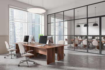 Modern office interior with large wooden desks and computers in front of glass-walled conference room. Contemporary design and city view. 3D Rendering
