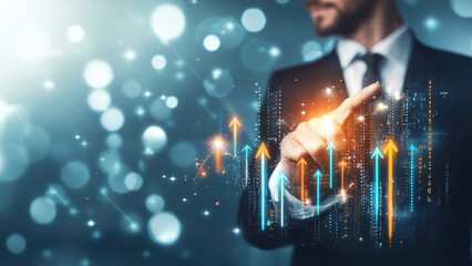 Obraz premium Man in a suit pointing at a graph on a screen.