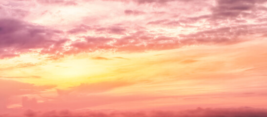 Sunset Sky Background,Summer Sunrise sky,Cloud with Orange,Yellow,Pink in Morning,Autumn nature landscape with sunny in evening.Winter dramatic sunlight over sea beach, Horizon Spring twilight