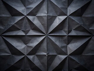 Fototapeta premium Intricate Black Paper Background with Symmetrical Creases Dividing into Four Distinct Parts, Perfect for Artistic Displays and Creative Design Projects