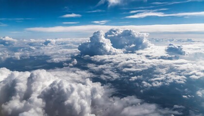 A stunning aerial view of a serene blue sky adorned with soft, wispy clouds, evoking a sense of peace and wonder in a breathtaking artistic representation captured from above.