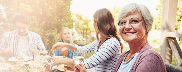 Family, banner and portrait of old woman and lunch in nature for thanksgiving event, food and...