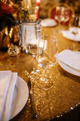 Elegant Table Setting with Gold Sequin Tablecloth