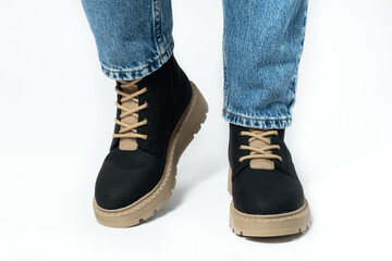 Womens boots, trendy winter shoes, isolate close-up.