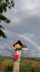 Charming Birdhouse with a Bird Feeder, Designed for Birds to Rest and Eat, Set in a Peaceful Outdoor Environment, Perfect for Attracting Wildlife, Bringing Nature Closer to Your Home