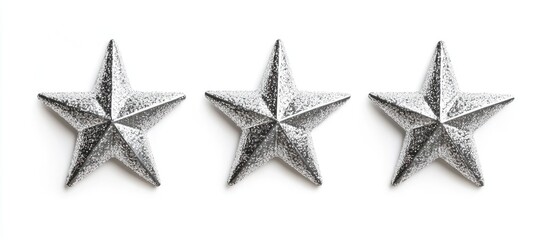 Obraz premium Silver glitter Christmas star stickers arranged on a white background for festive decoration and holiday craft projects.
