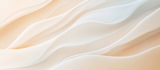 Obraz premium Soothing abstract depiction of beach sand and gentle ocean waves in soft pastel colors for serene backgrounds and design projects.