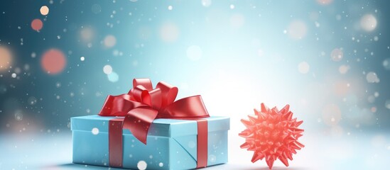 Gift box with red ribbon symbolizing gift exchange during festive season with sparkling background and a star decoration in soft focus