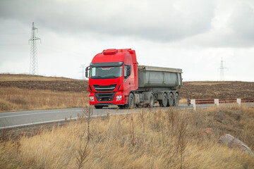 Truck driving at the highways. Transportation. Delivery