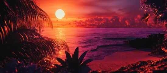 Vibrant summer sunset at the shore with UV filter enhancing colors and creating a serene tropical atmosphere over calm waters