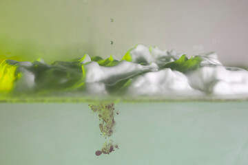 schaum farbe tropfen wasser grün gelb