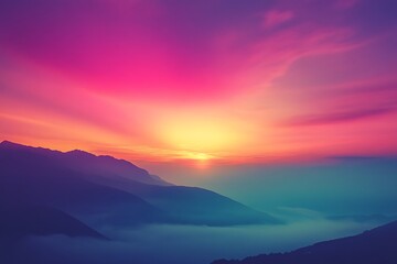 Obraz premium Vibrant Sunset Over Misty Mountain Ranges