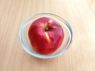 Red and green apples on the table