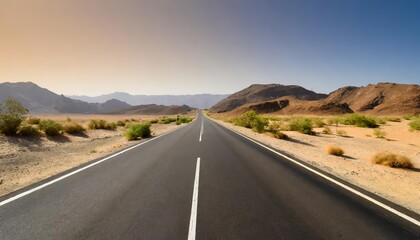 Fototapeta premium Lonely Asphalt Road Stretching Through an Expansive Desert Landscape with Rugged Hills and Endless Horizons Capturing the Spirit of Adventure and Exploration under a Vast Blue Sky
