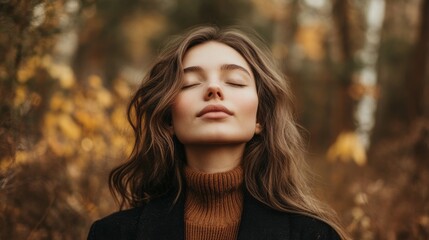 Naklejka premium A woman is sitting in a forest, wearing a brown sweater