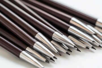 Fototapeta premium Neatly Arranged Welding Rods on White Background