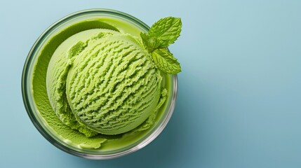 Fototapeta premium Creamy green mint ice cream in a glass bowl.