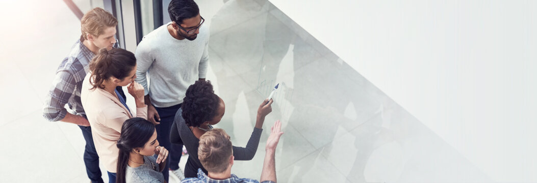 Office, glass wall and business people with graphs for planning, market trends and project performance. Mockup space, employees and team analyst with marker for training, workshop and review insights