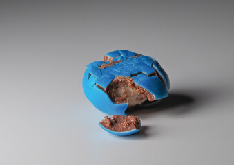 earth globe with broken pieces. global warming.