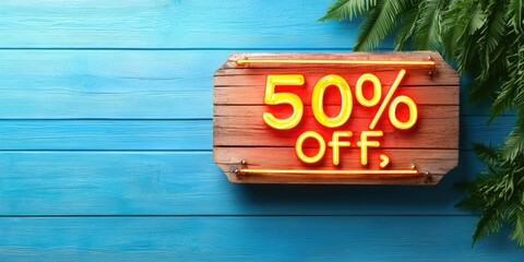 A vibrant sign displays "50% OFF" on a wooden board against a blue background, surrounded by greenery, promoting a sale or discount.