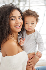 Love of a mother and child, baby. Family at home. Lifestyle